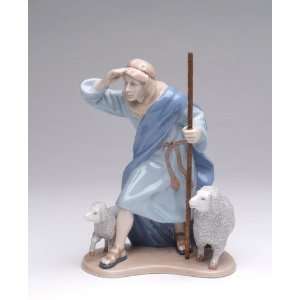   Statue In Blue Robe With Staff And Two White Sheep