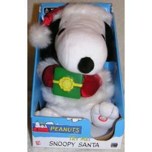   Snoopy Santa Animated Musical Doll Holding Present Toys & Games