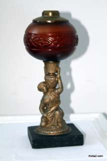 Victorian figural oil lamp  