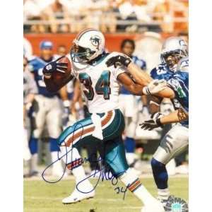  Autographed Thurman Thomas Picture   (Miami Dolphins8x10 