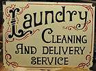 laundry cleaning and delivery service women cave metal vintage looking