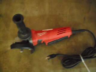 MILWAUKEE 4 1/2IN ANGLE GRINDER AND 12V IMPACT WRENCH  
