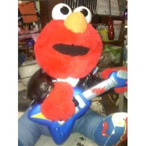  Rock & Roll Elmo ~ Guitar Playing & Singing: Toys & Games