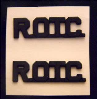 This is an old stock US Army ROTC letters pin set of two pins. black 
